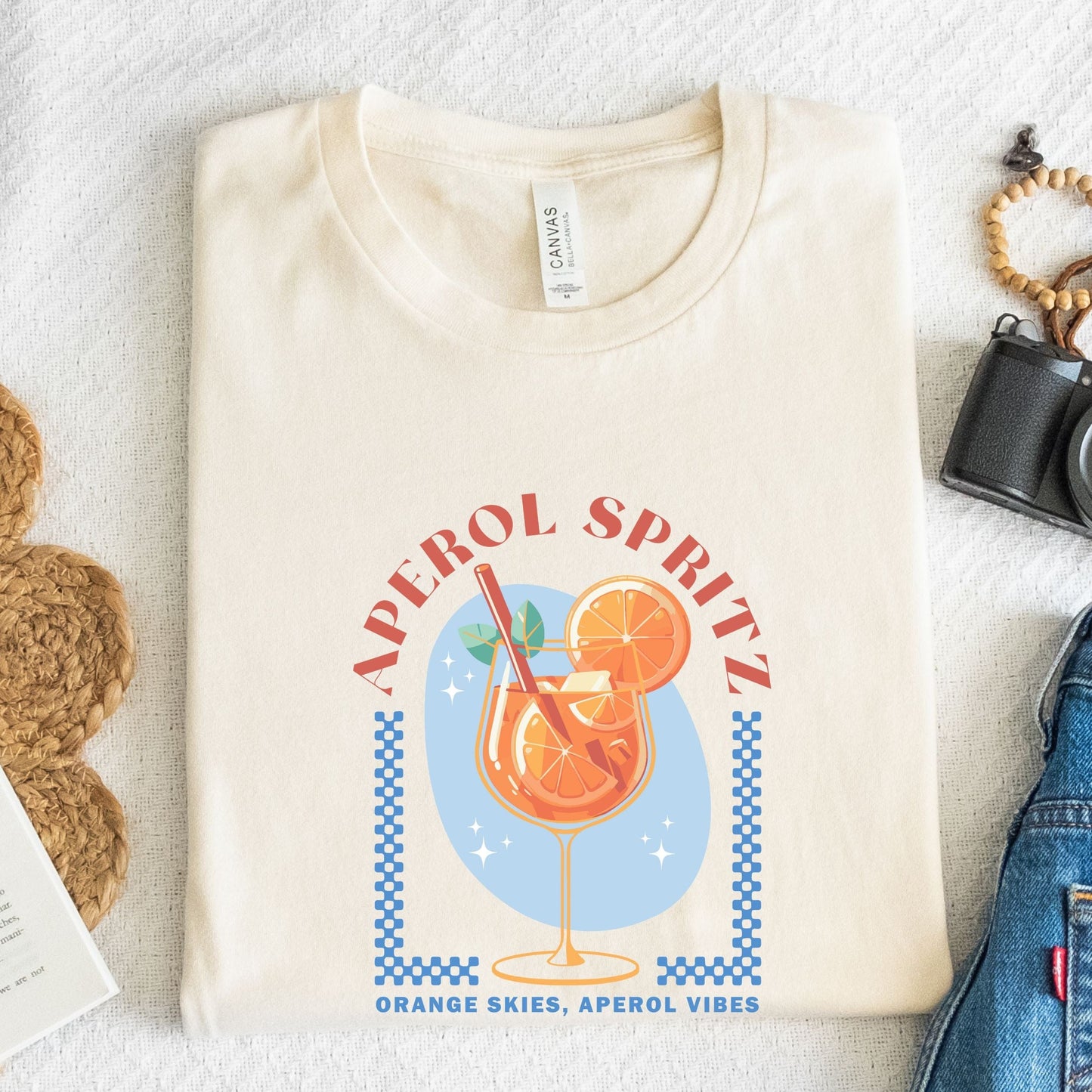 Aperol Spritz t-shirt with orange cocktail glass and summer retro vibes design