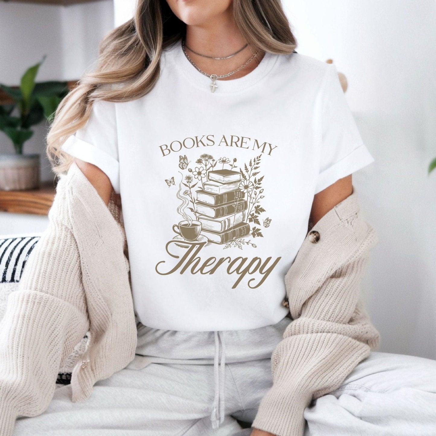 “Books Are My Therapy” t-shirt with vintage floral book stack, butterflies, and a coffee cup — perfect for cozy book lovers.