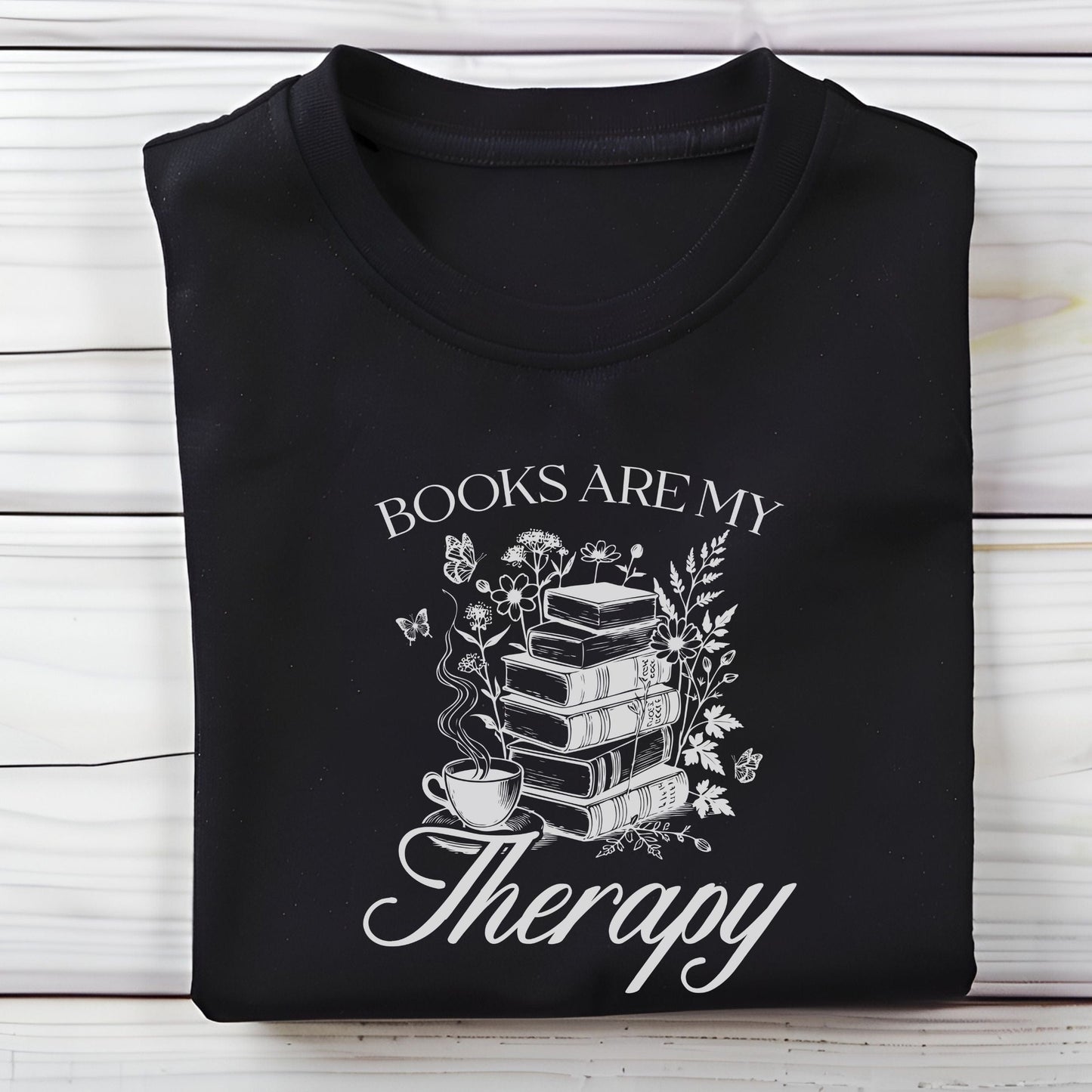“Books Are My Therapy” t-shirt with vintage floral book stack, butterflies, and a coffee cup — perfect for cozy book lovers.