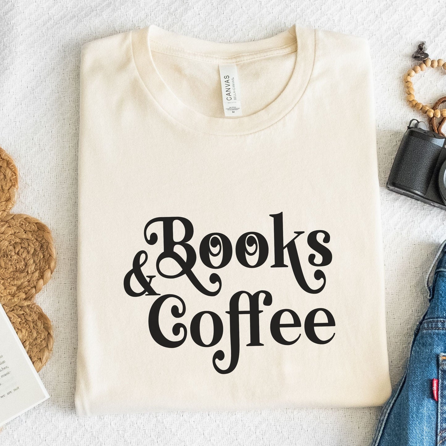 “Books & Coffee” t-shirt in bold minimalist lettering, perfect for readers and coffee lovers.
