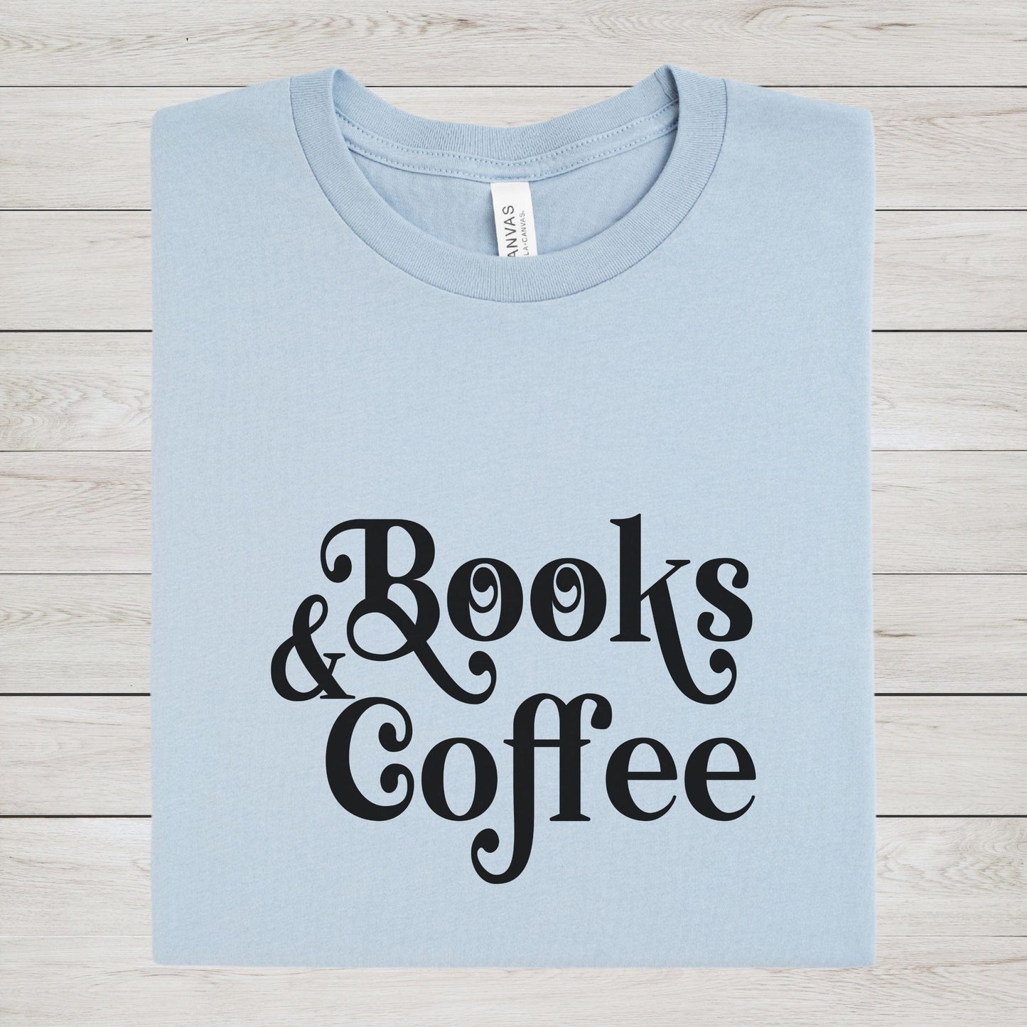 “Books & Coffee” t-shirt in bold minimalist lettering, perfect for readers and coffee lovers.