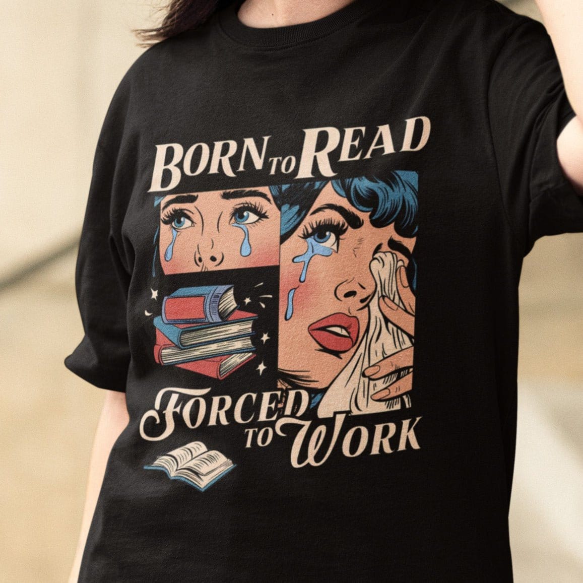 Comic-style “Born to Read, Forced to Work” t-shirt with crying girl, stacked books, and vintage pop-art design.