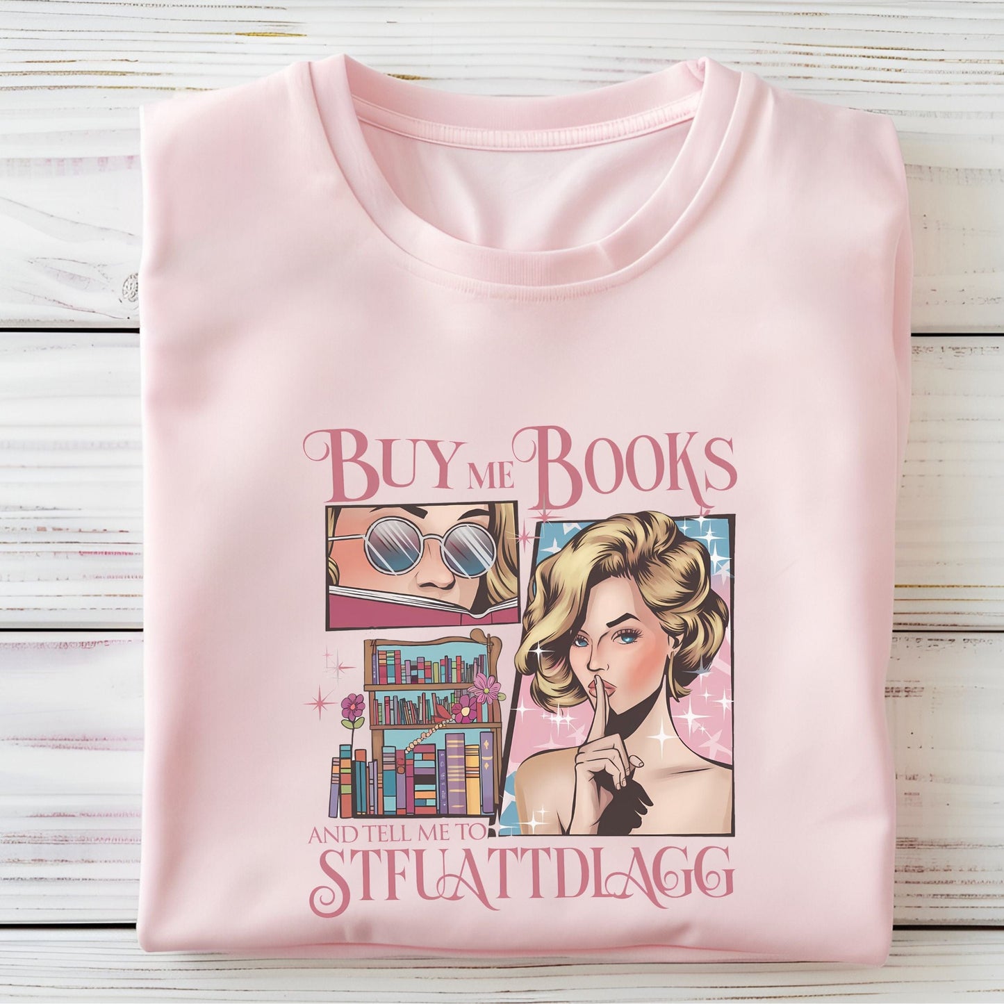 “Buy Me Books and Tell Me to STFUATTDLAGG” t-shirt with retro glam comic art, sassy woman, bookshelves, and pink sparkly accents.