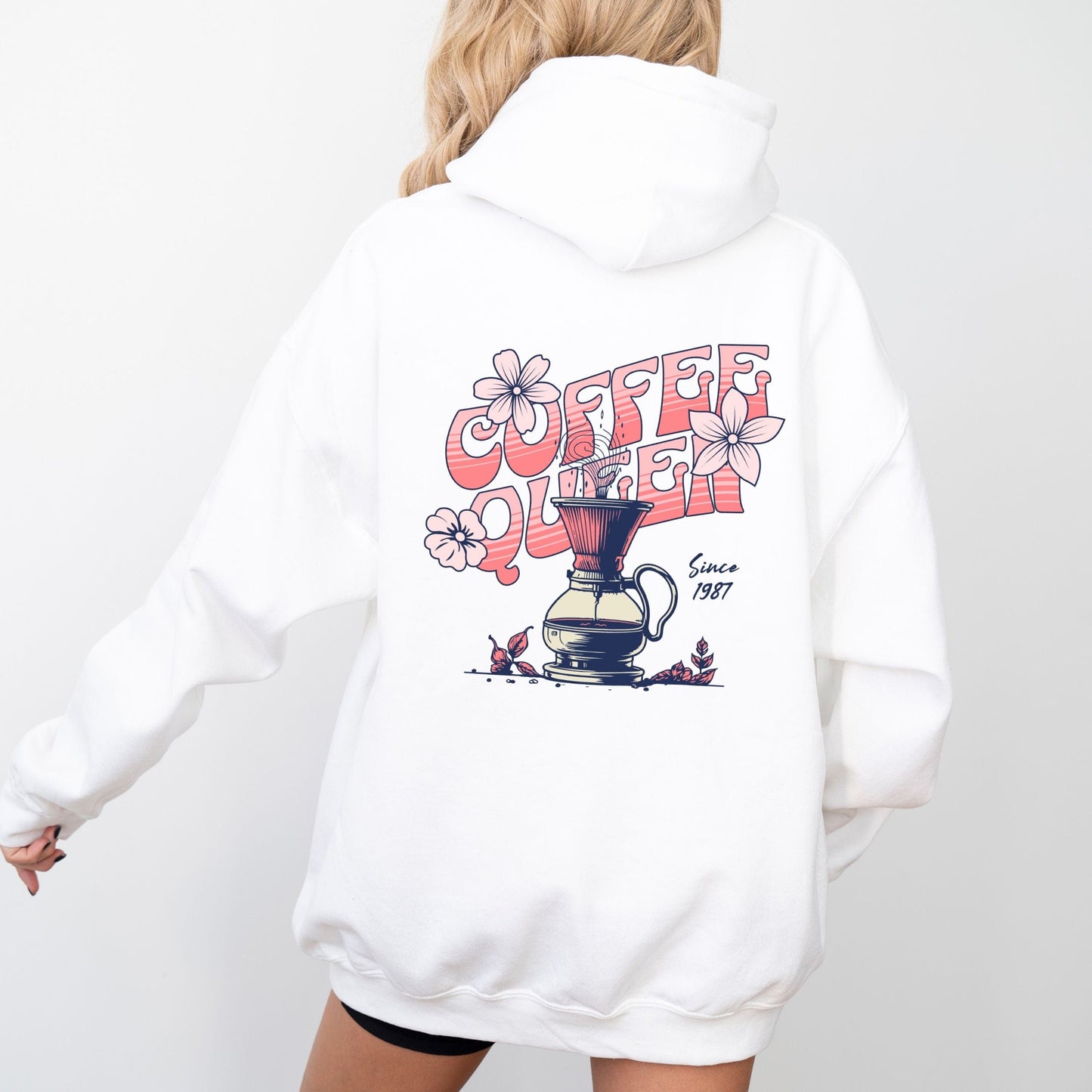 Retro-style “Coffee Queen” text with floral accents and a coffee pour-over illustration on back of a hoodie