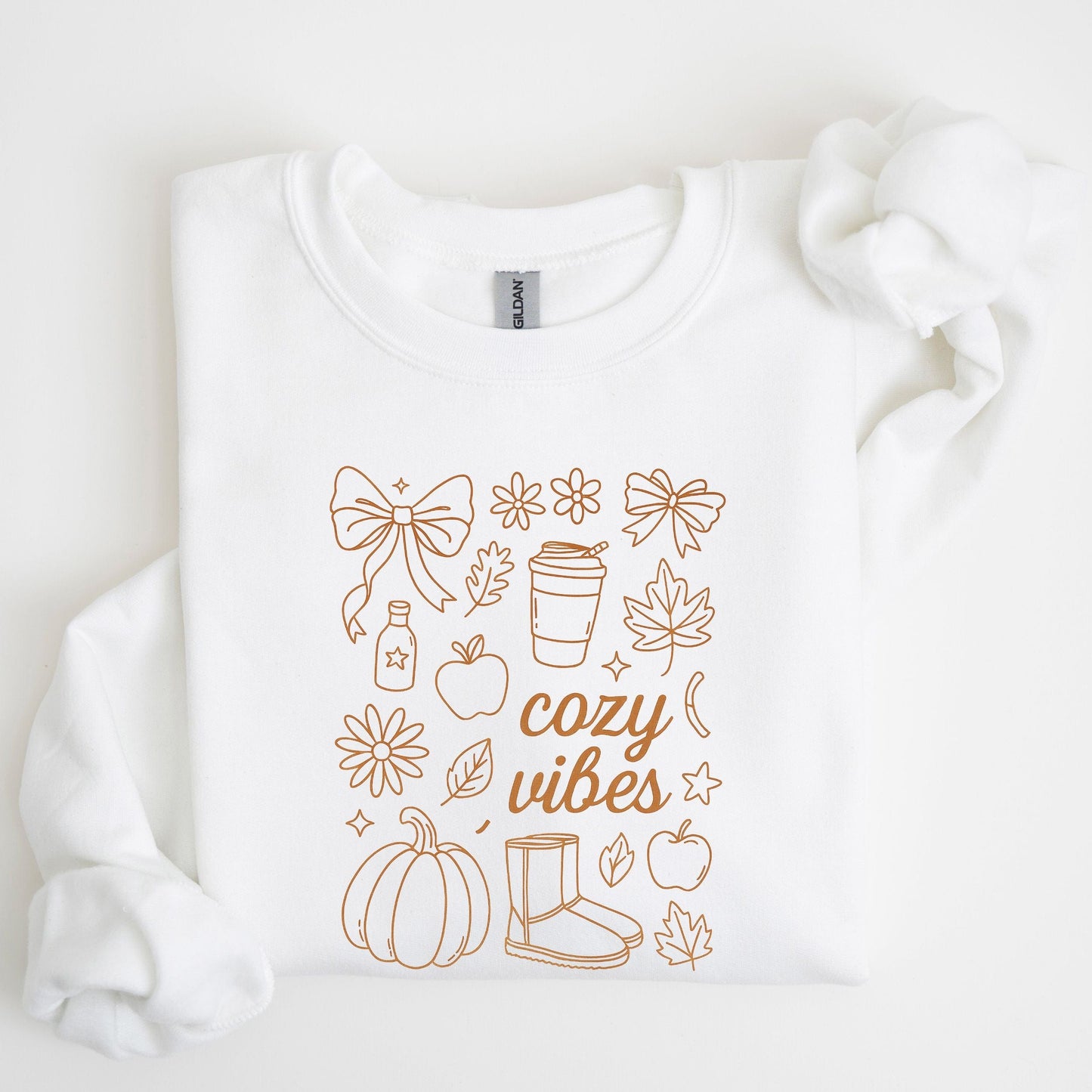 Cozy Vibes fall aesthetic sweatshirt with bows, pumpkins, coffee cup, and autumn leaves