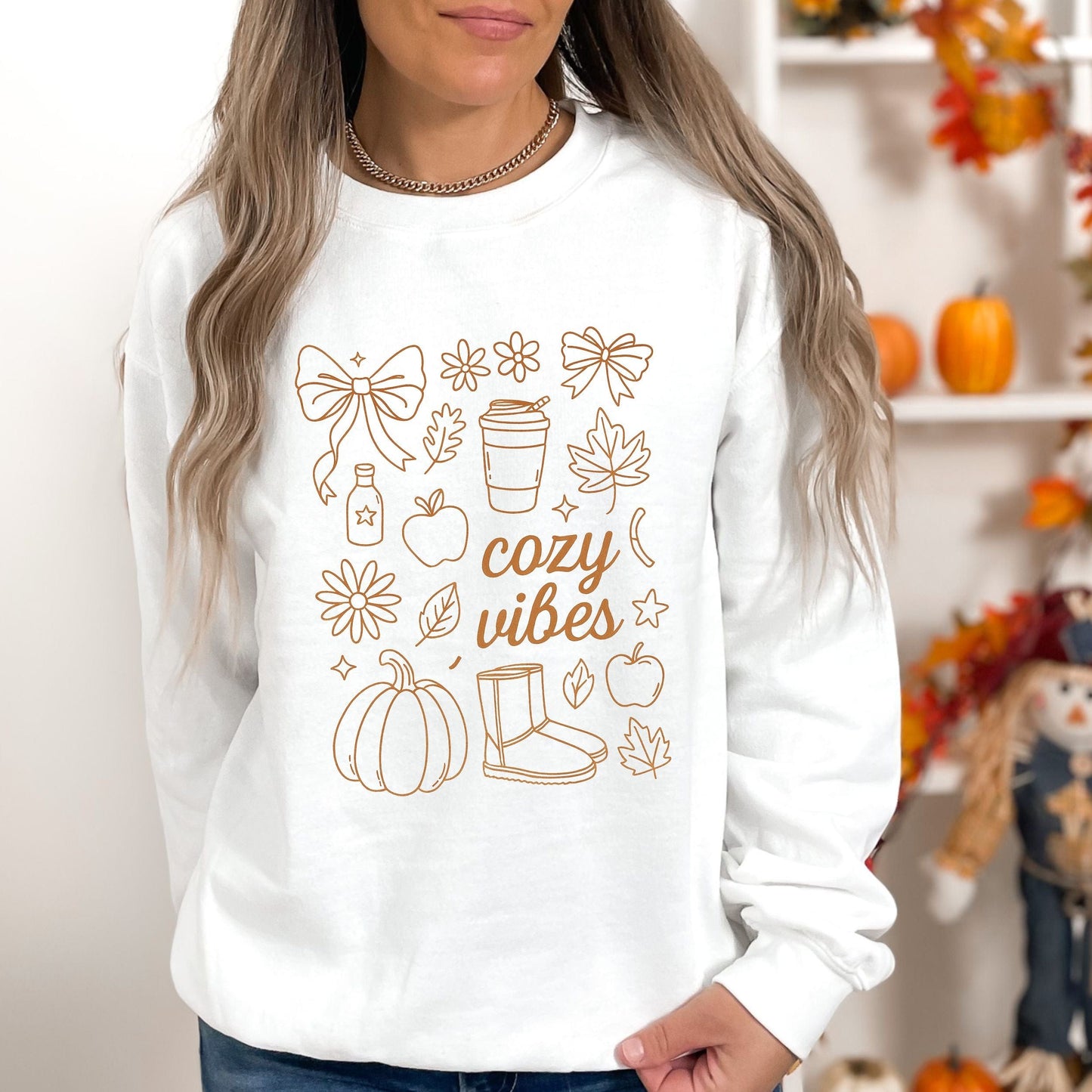Cozy Vibes fall aesthetic sweatshirt with bows, pumpkins, coffee cup, and autumn leaves