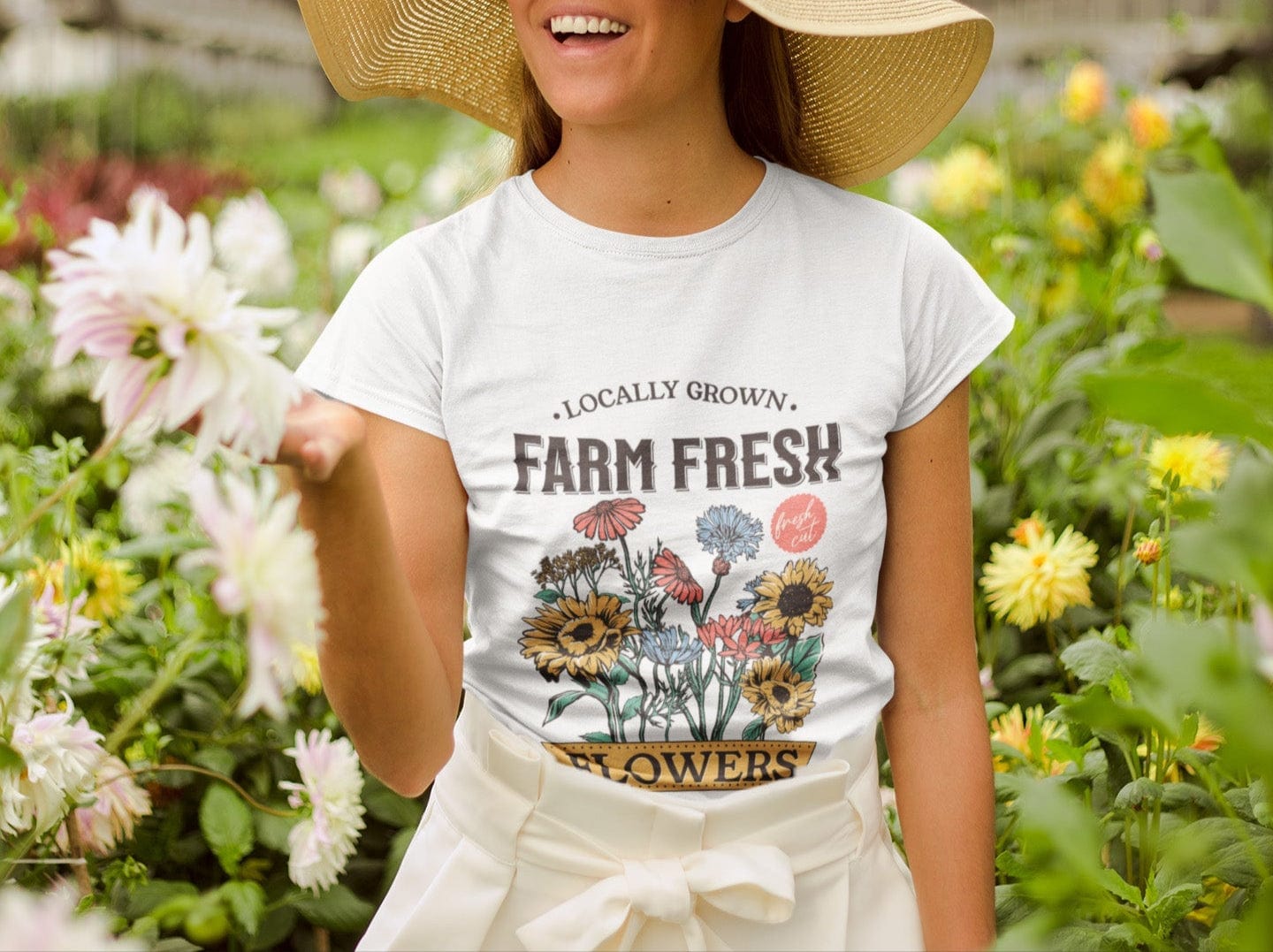 “Farm Fresh Flowers” t-shirt with vintage hand-drawn wildflowers, sunflowers, and colorful bouquet design. Includes “Locally Grown” and “Fresh Cut” text.