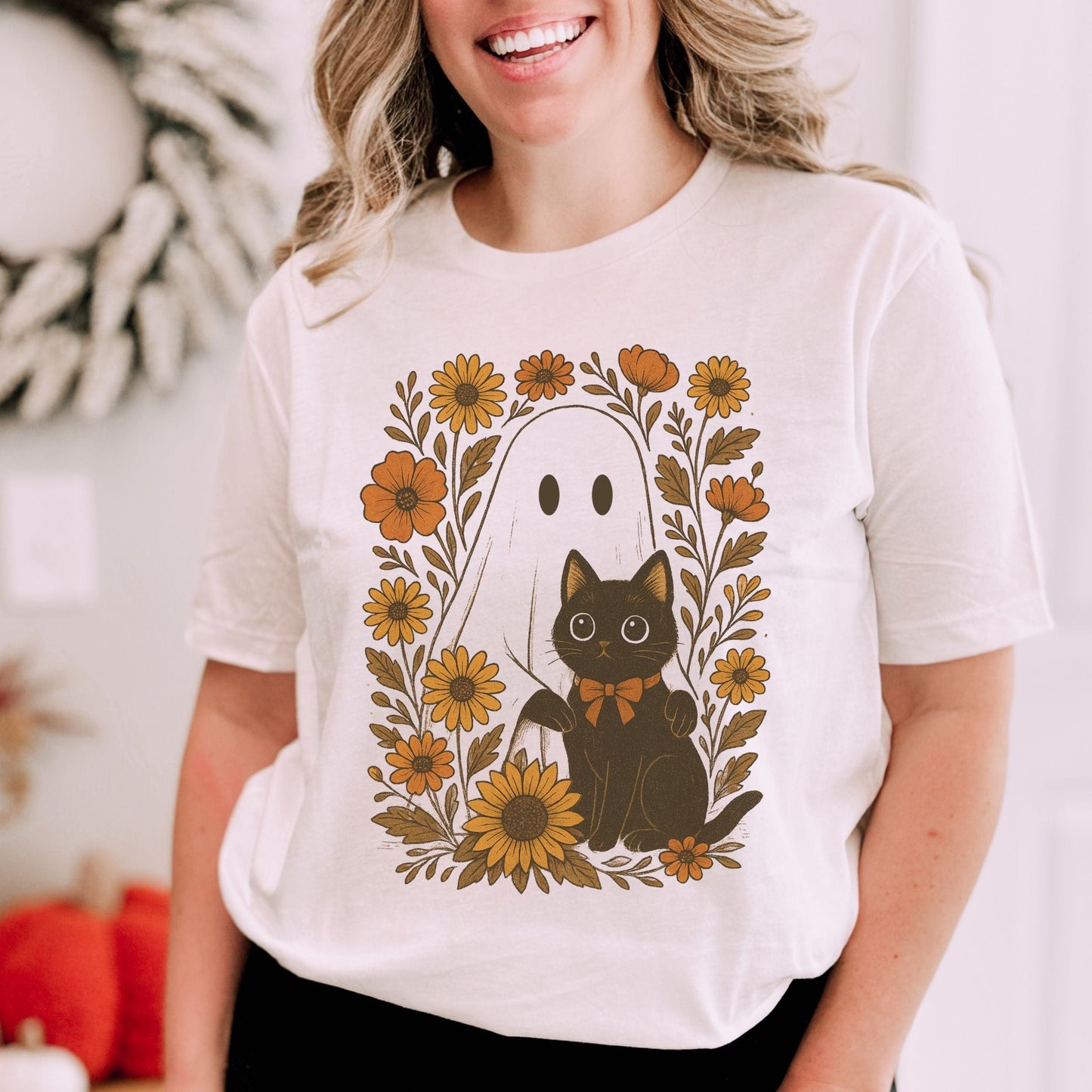 Vintage ghost and black cat t-shirt with sunflowers and fall floral design, autumn aesthetic Halloween shirt