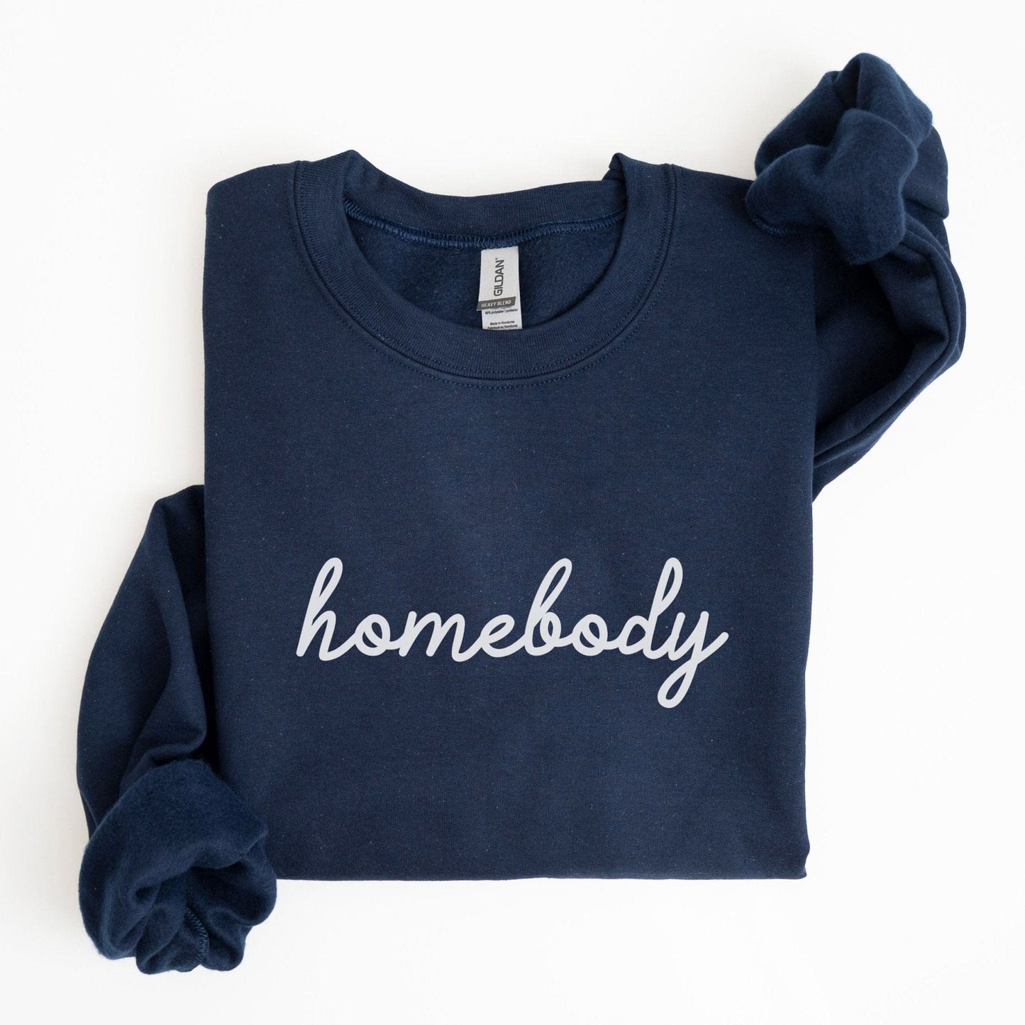 “Homebody” sweatshirt with minimalist script design — cozy neutral crewneck perfect for introverts and lovers of slow days.