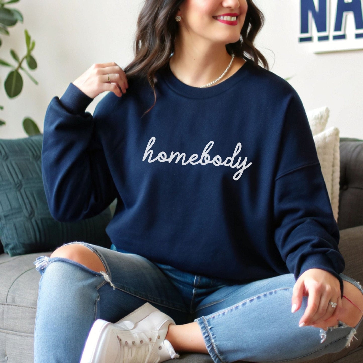 “Homebody” sweatshirt with minimalist script design — cozy neutral crewneck perfect for introverts and lovers of slow days.