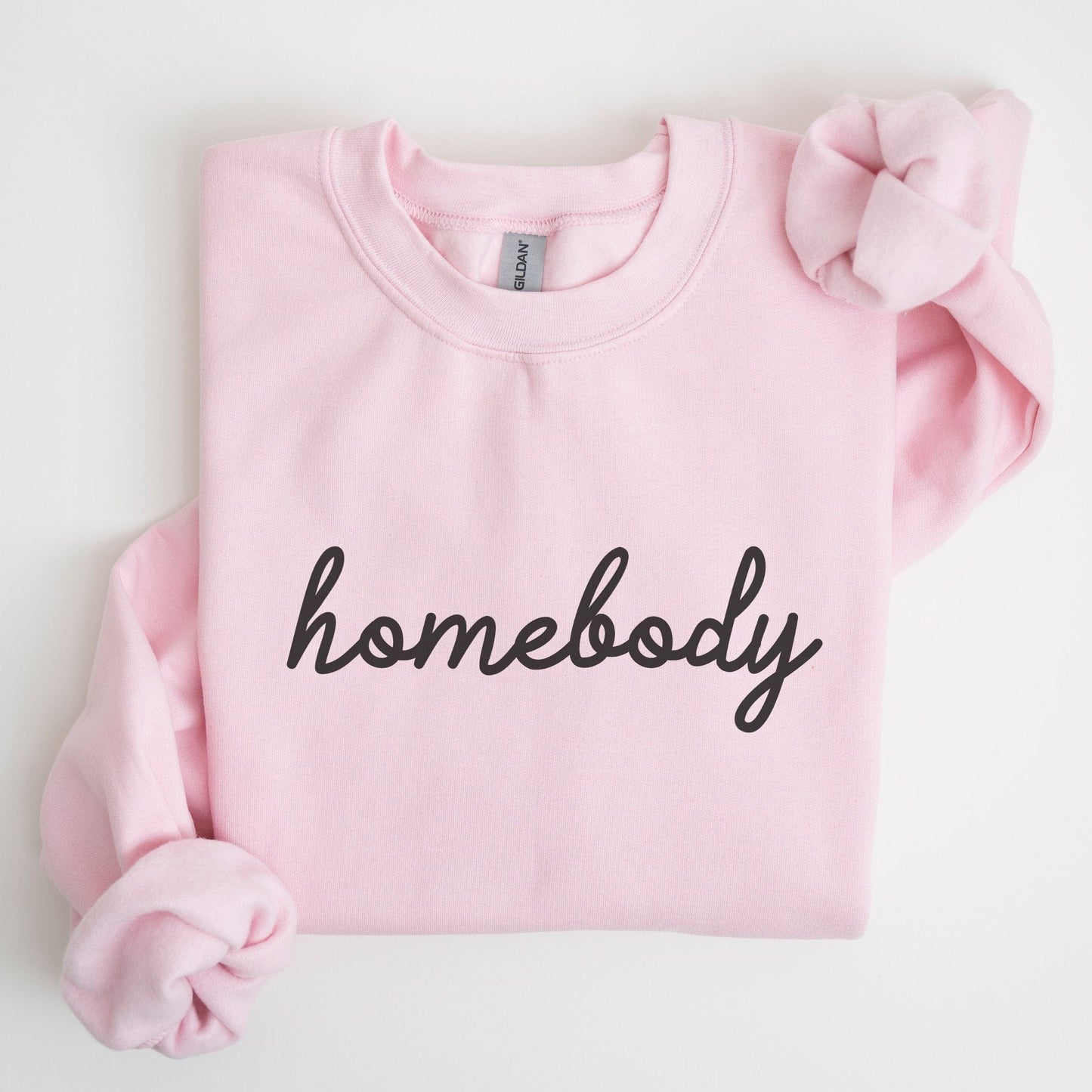 “Homebody” sweatshirt with minimalist script design — cozy neutral crewneck perfect for introverts and lovers of slow days.
