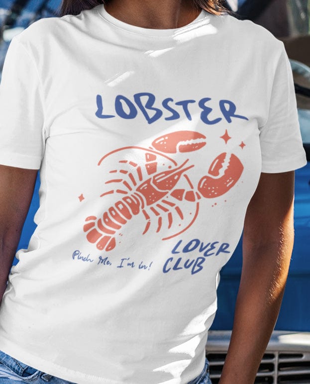 Colorful cartoon lobster with the phrase "Lobster Lover Club – Pinch Me, I'm In!" on a fun summer t-shirt for seafood and beach lovers.