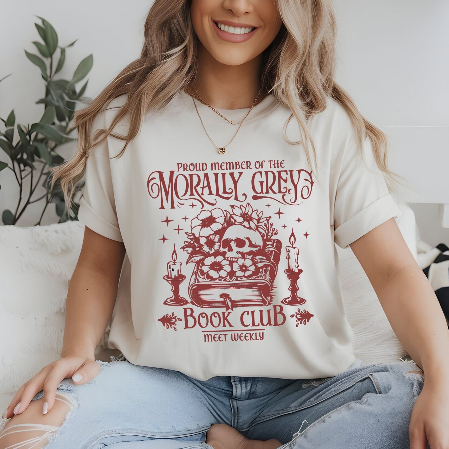 Person wearing “Morally Grey Book Club” t-shirt with gothic typography