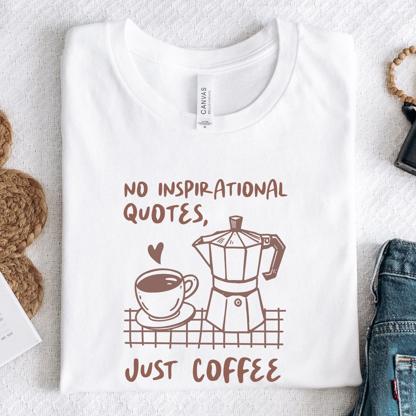 Minimalist text graphic tee that reads “No inspirational quotes. Just coffee.”