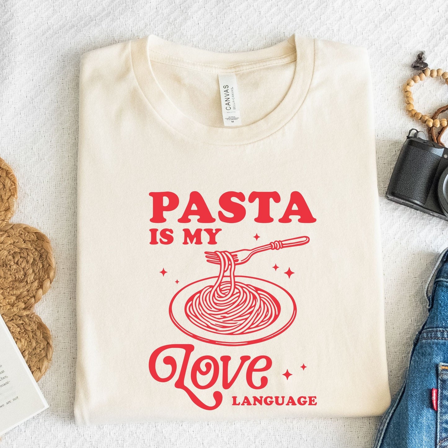 Red "Pasta Is My Love Language" graphic on a comfy t-shirt with a spaghetti illustration, perfect for foodies and pasta lovers