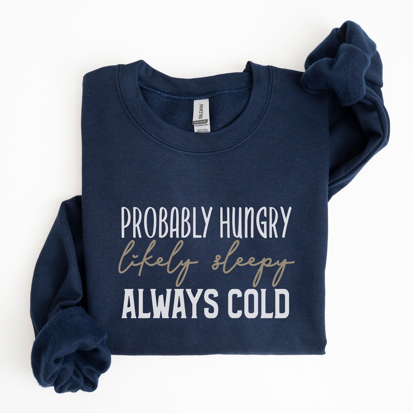 Funny “Probably Hungry, Always Cold” sweatshirt with neutral text on a cozy crewneck — perfect for comfort lovers and snack queens.