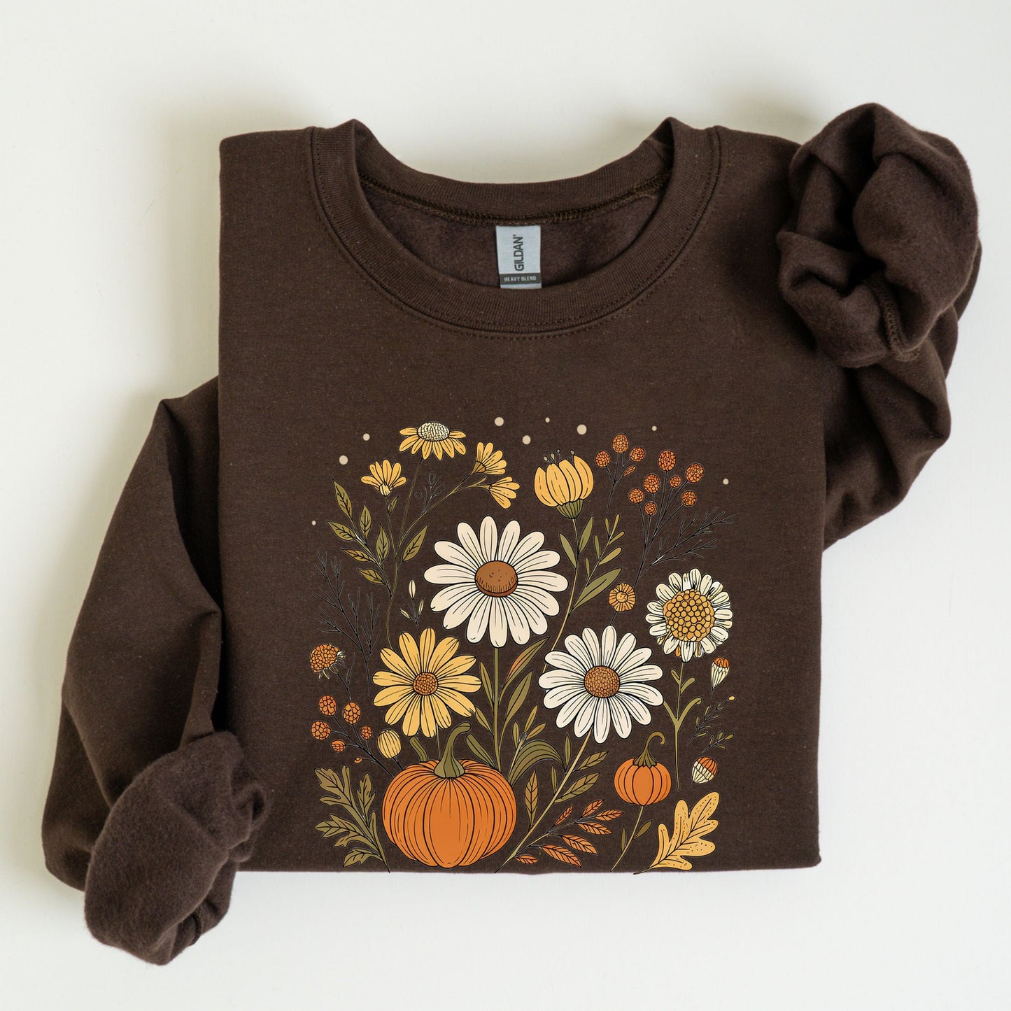 Pumpkin and wildflower fall sweatshirt in neutral tones, cozy autumn cottagecore style