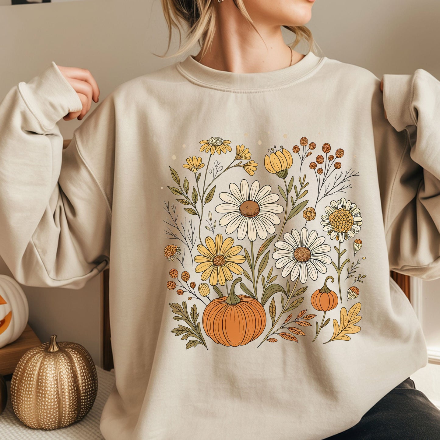Pumpkin and wildflower fall sweatshirt in neutral tones, cozy autumn cottagecore style