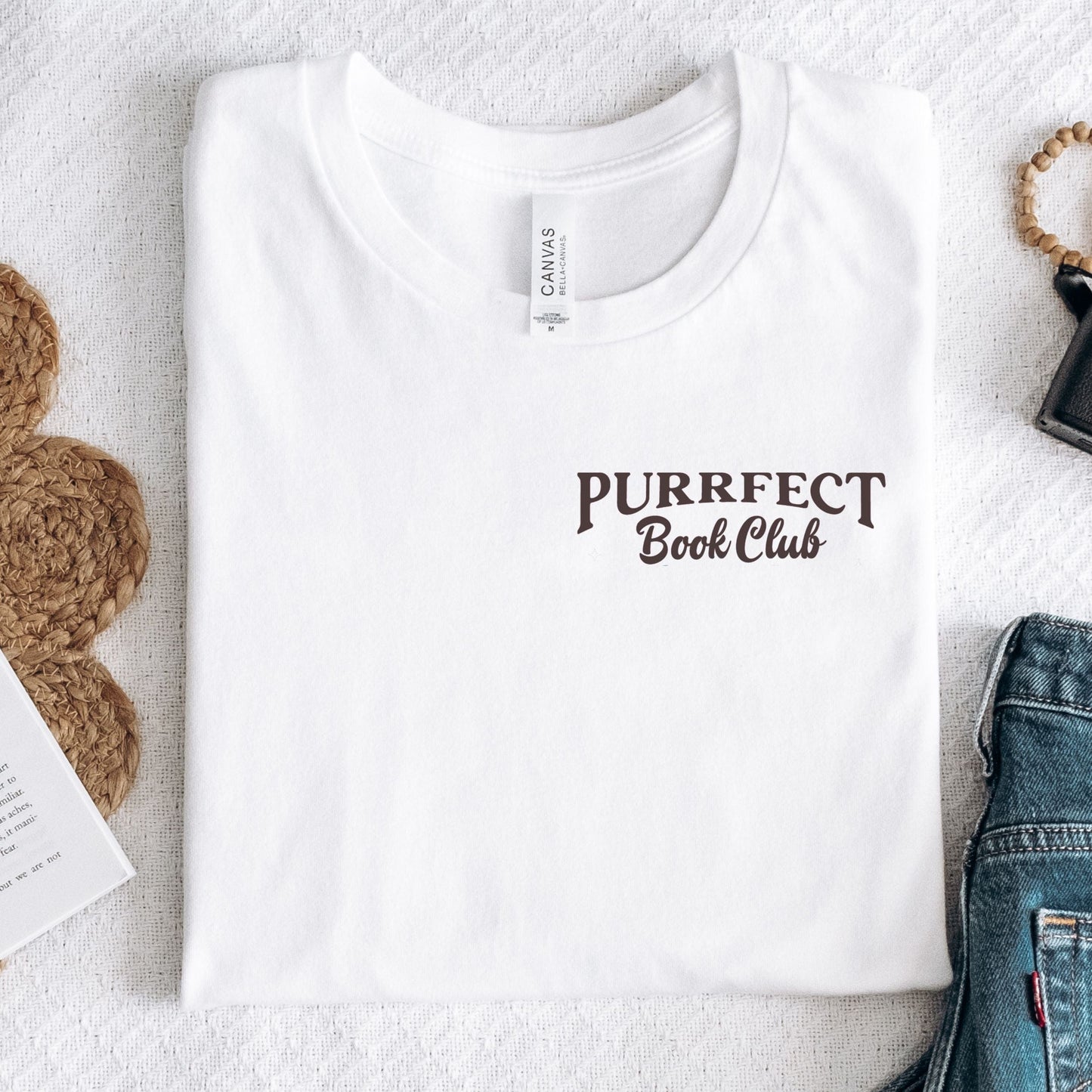 Folded t-shirt showing front logo in white