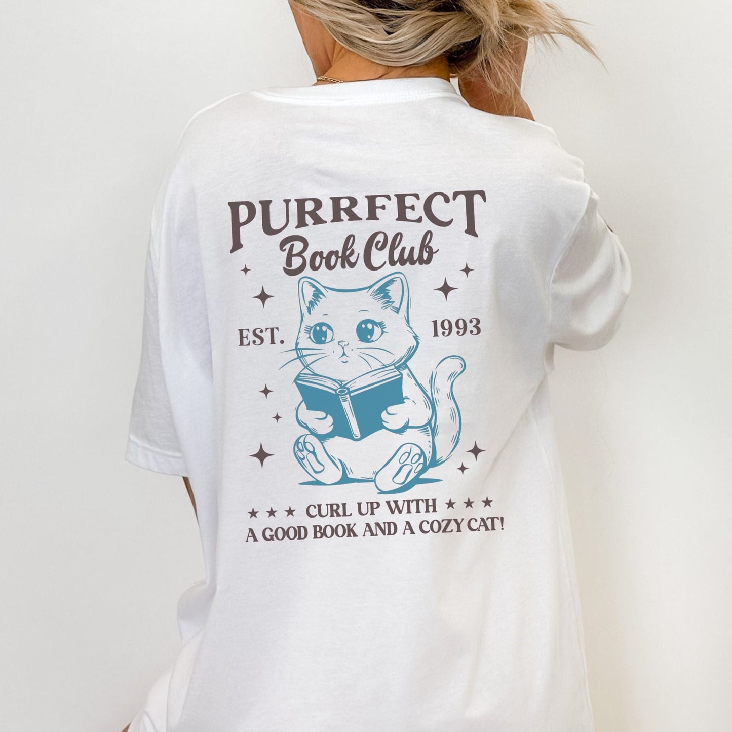 Illustrated cat reading a book with “Purrfect Book Club” text