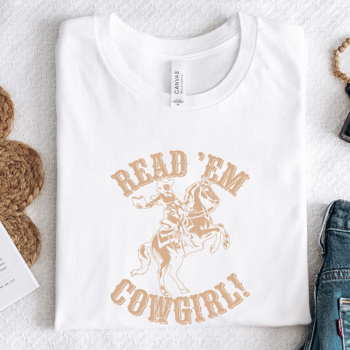 Folded tee with vintage cowgirl and horse illustration in white