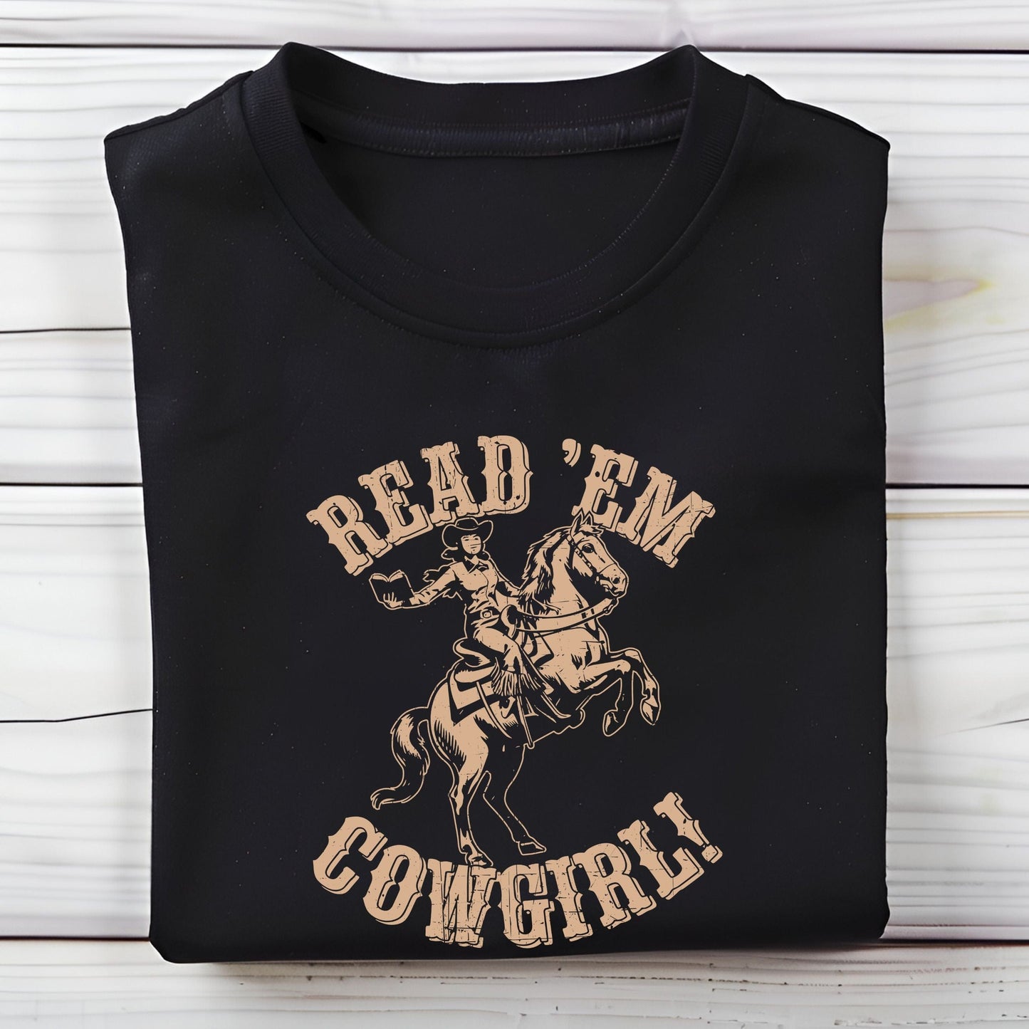 Folded tee with vintage cowgirl and horse illustration in black