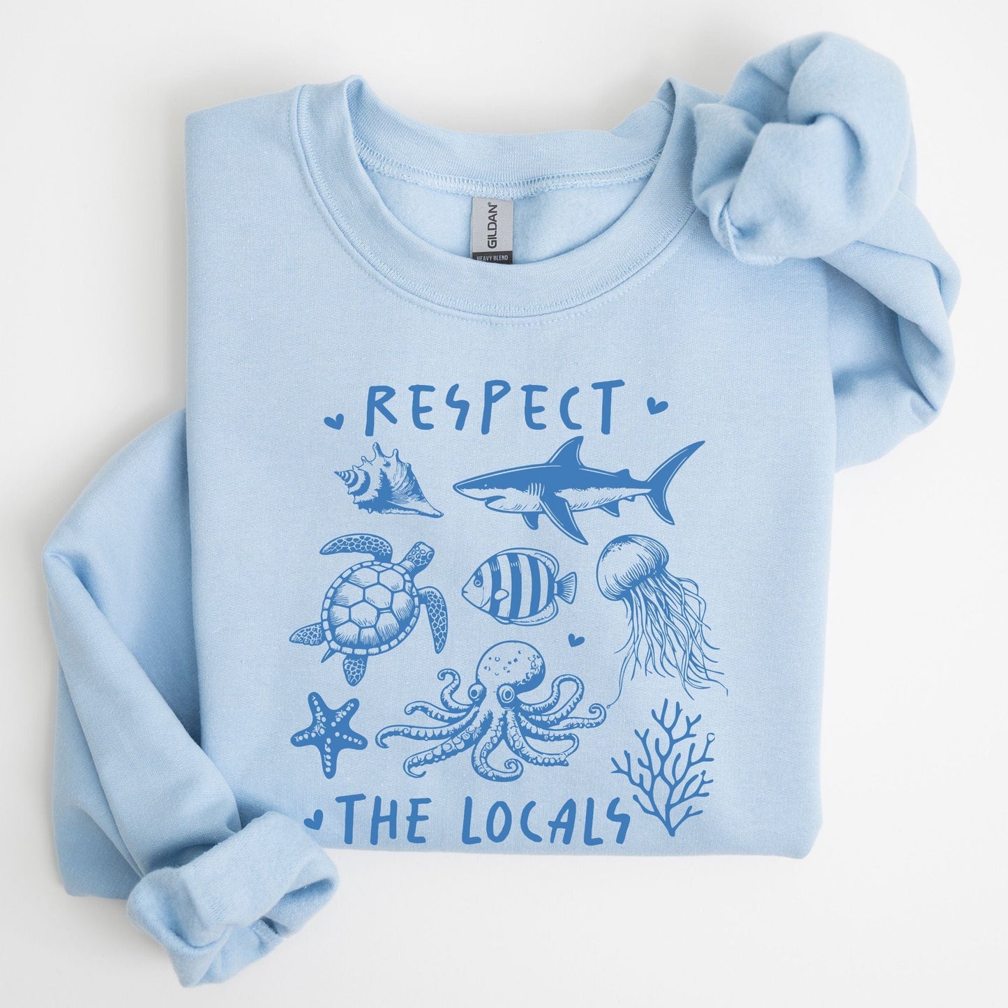Respect the Locals sweatshirt with sea creatures in blue line art for ocean lovers