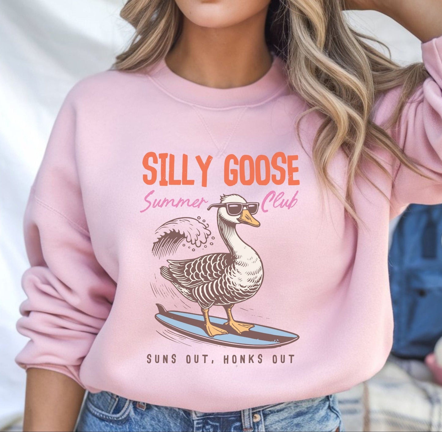 Silly Goose summer sweatshirt with surfing goose graphic and retro beach theme