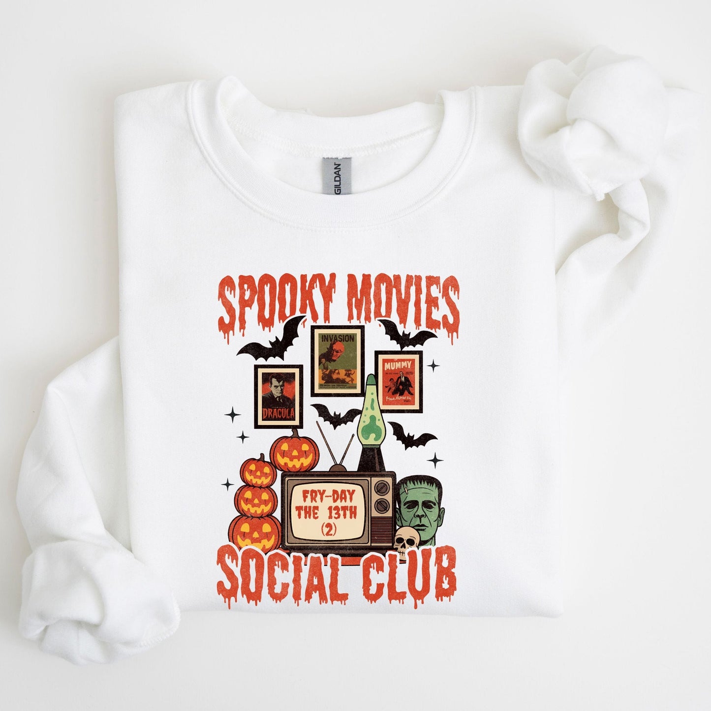Spooky Movies Social Club Halloween sweatshirt with retro TV, jack-o-lanterns, and Frankenstein design