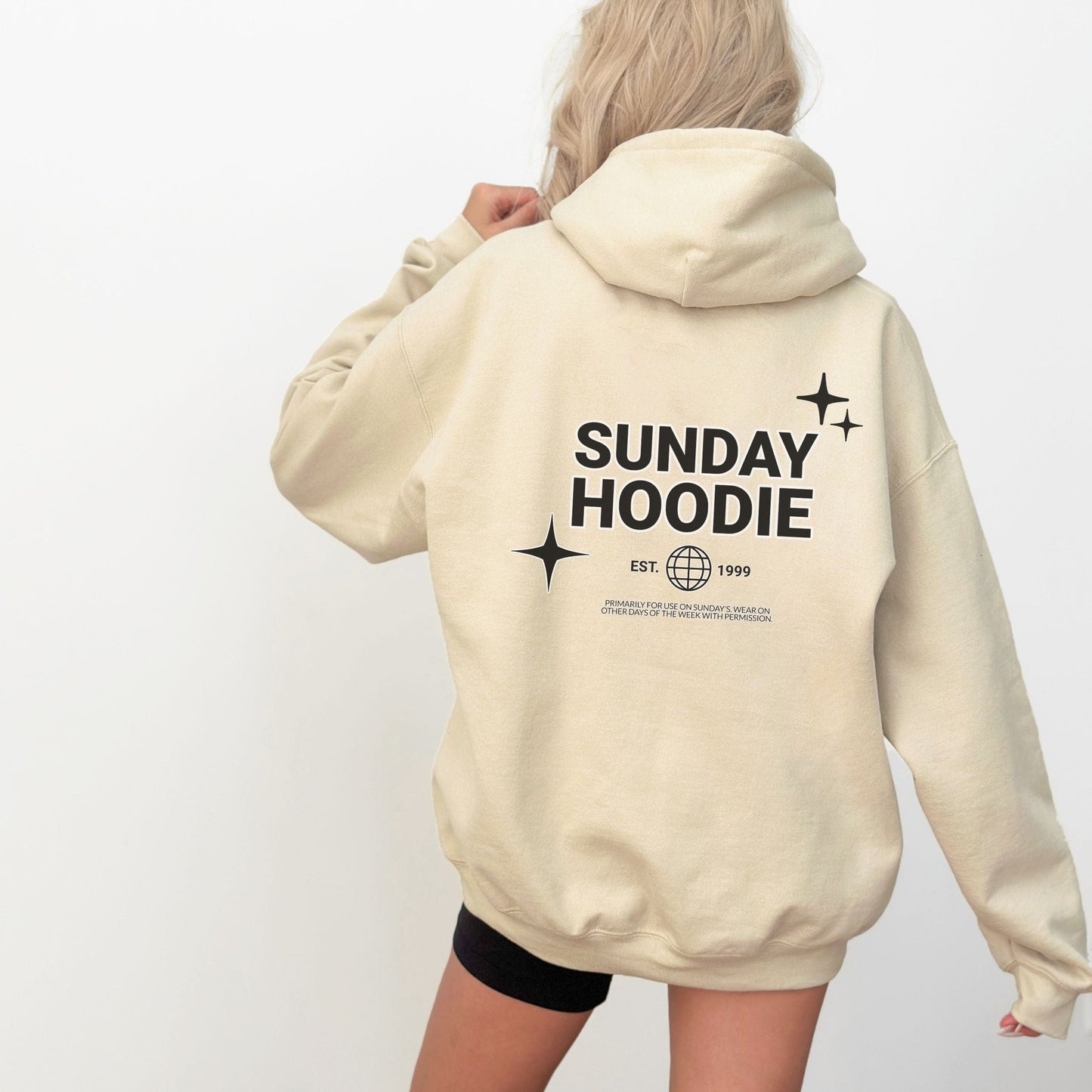 Hoodie with back graphic that says "Sunday Hoodie" with globe and star icons. Comfy loungewear perfect for slow weekends and casual days.