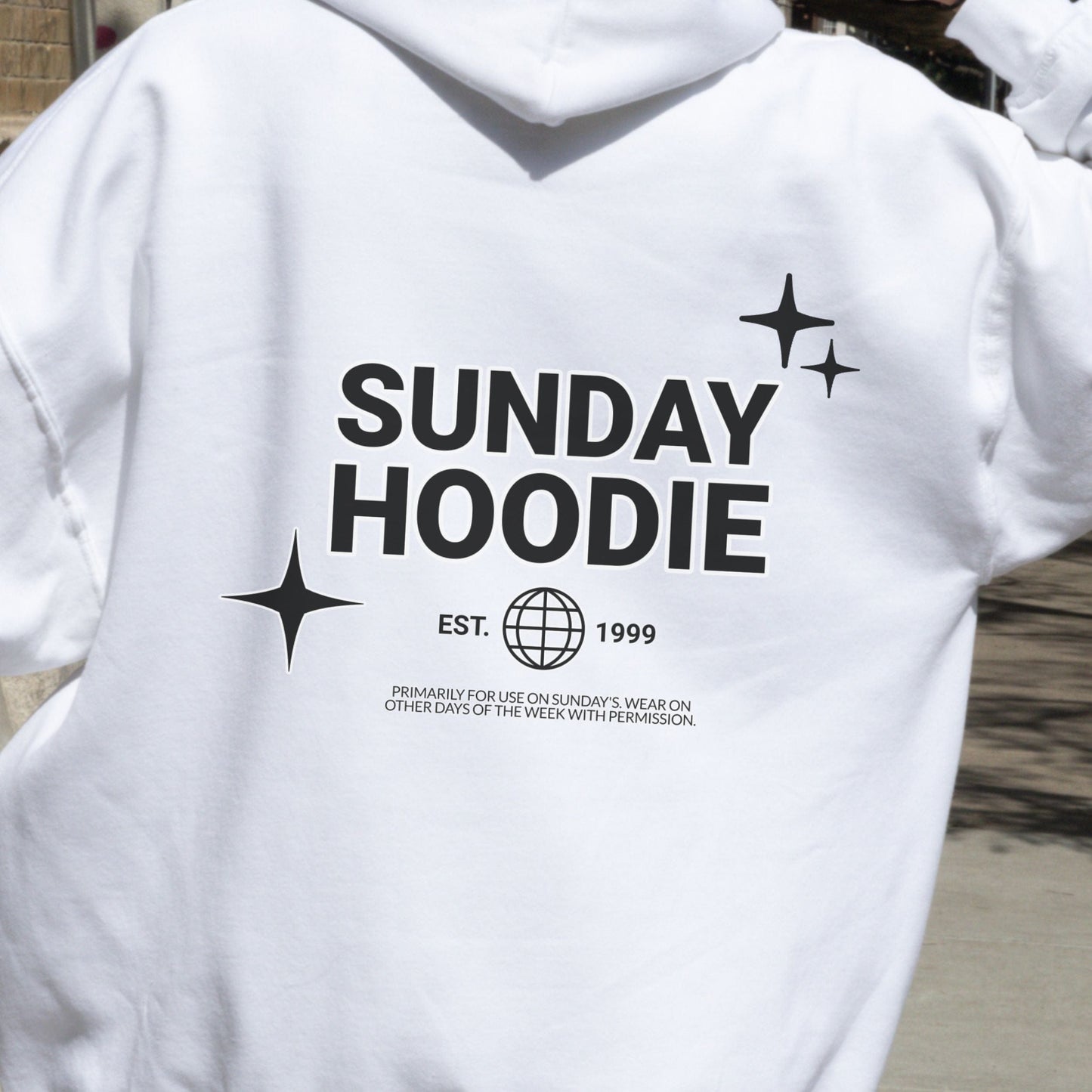 Hoodie with back graphic that says "Sunday Hoodie" with globe and star icons. Comfy loungewear perfect for slow weekends and casual days.