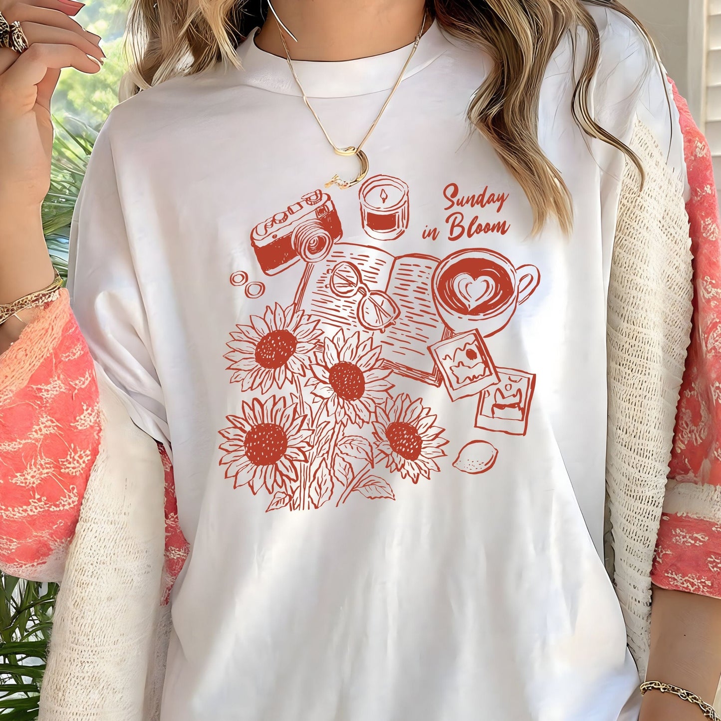 T-shirt with 'Sunday in Bloom' design featuring coffee, book, flowers, and vintage camera in white