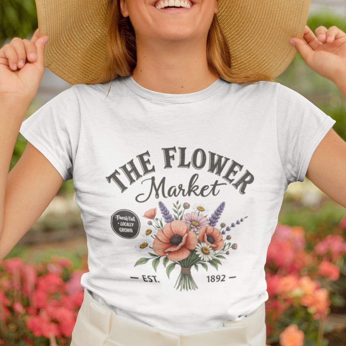 “The Flower Market” t-shirt with vintage typography and a bouquet of poppies, daisies, lavender, and wildflowers, featuring “Fresh Cut • Locally Grown.”