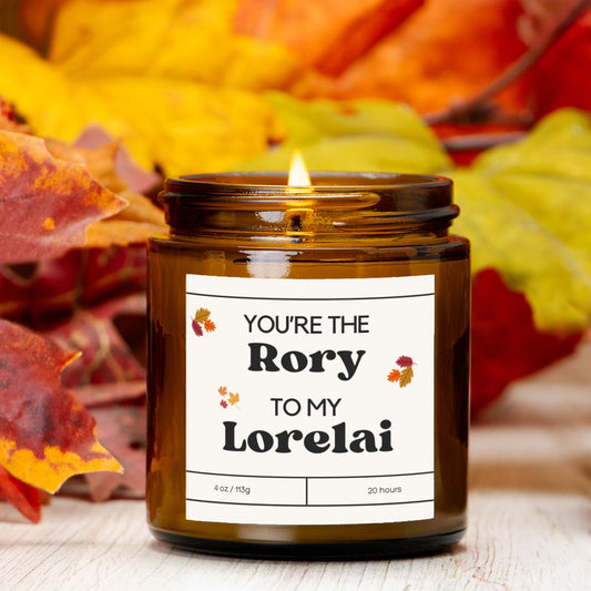 Gilmore Girls inspired candle with "You're the Rory to my Lorelai" design in a amber jar