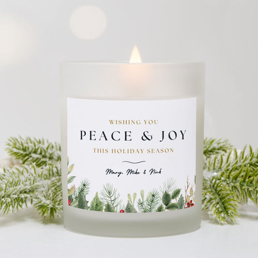 Personalized frosted glass candle with 'Wishing You Peace & Joy This Holiday Season' design in coconut soy.