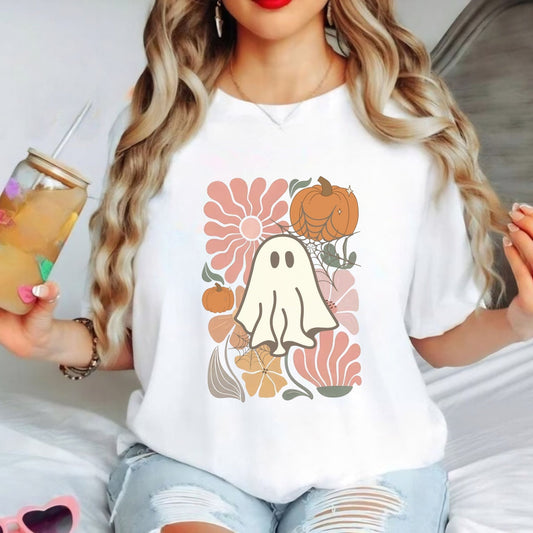 Halloween shirt with cute ghost, pumpkins, and retro floral design.