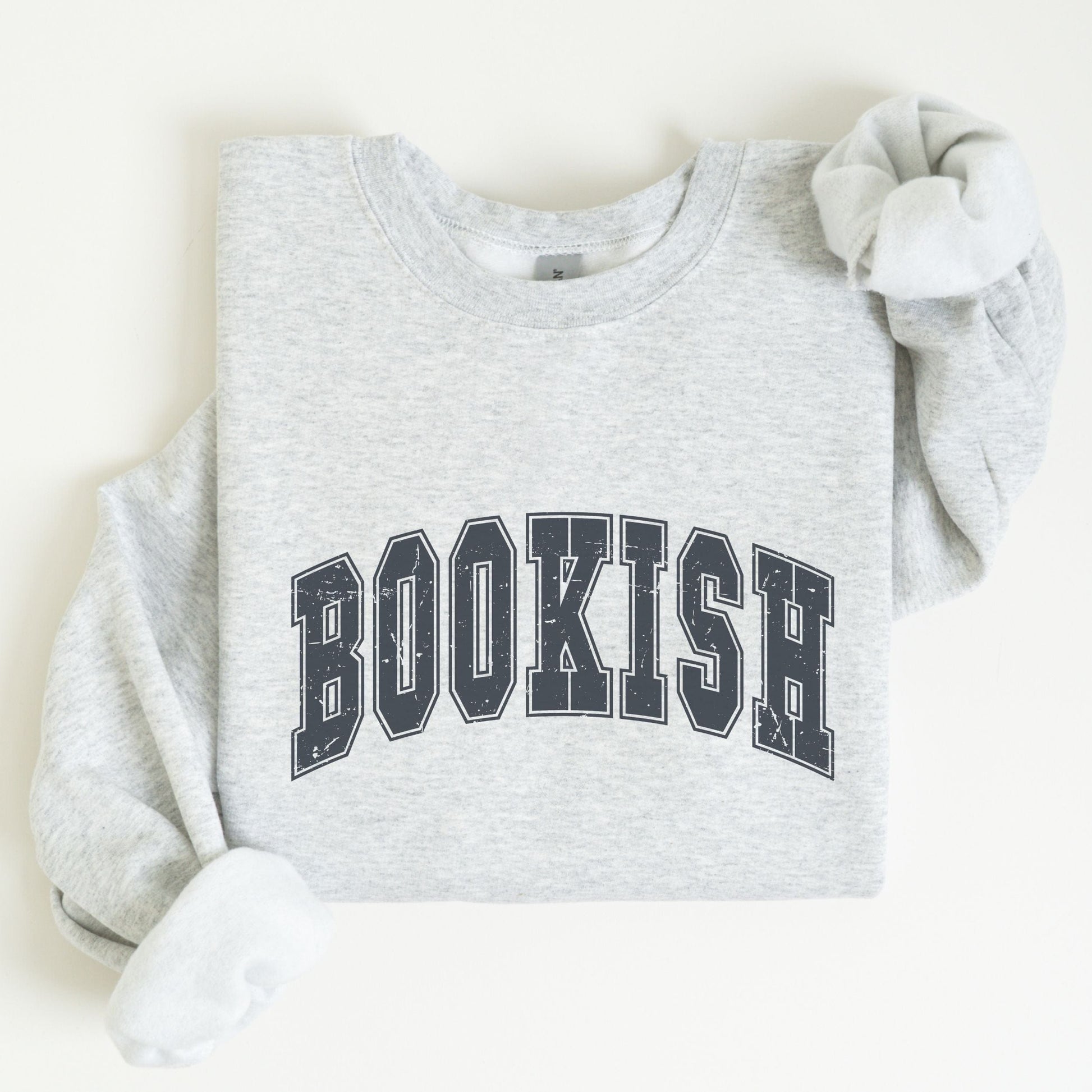 “Bookish” sweatshirt with bold varsity-style text — clean, cozy crewneck for proud readers and literary lovers.
