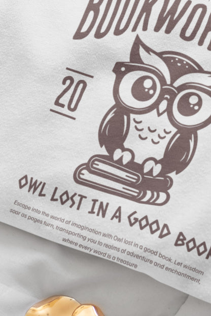 Bookworm sweatshirt with owl reading design for cozy book lovers, perfect literary apparel.