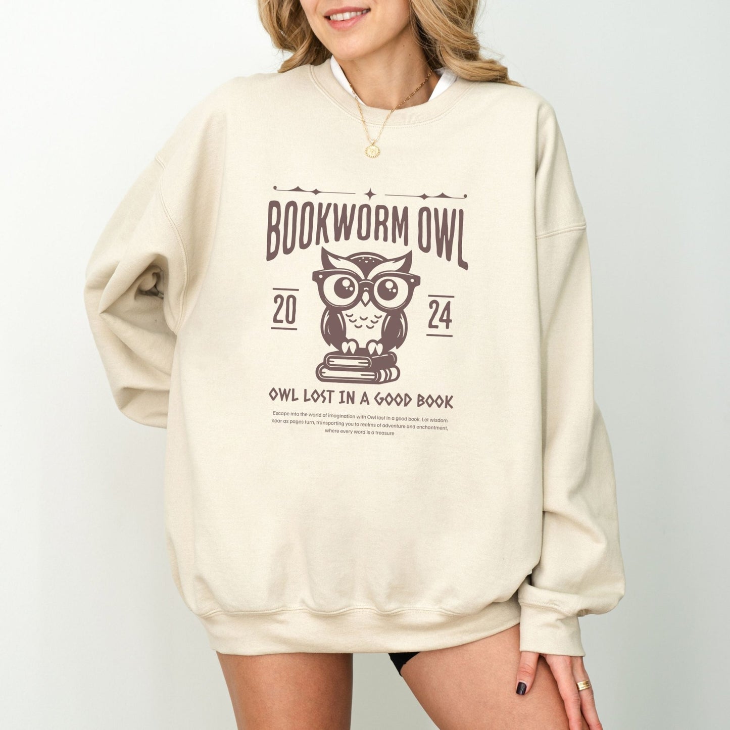 Bookworm sweatshirt with owl reading design for cozy book lovers, perfect literary apparel.