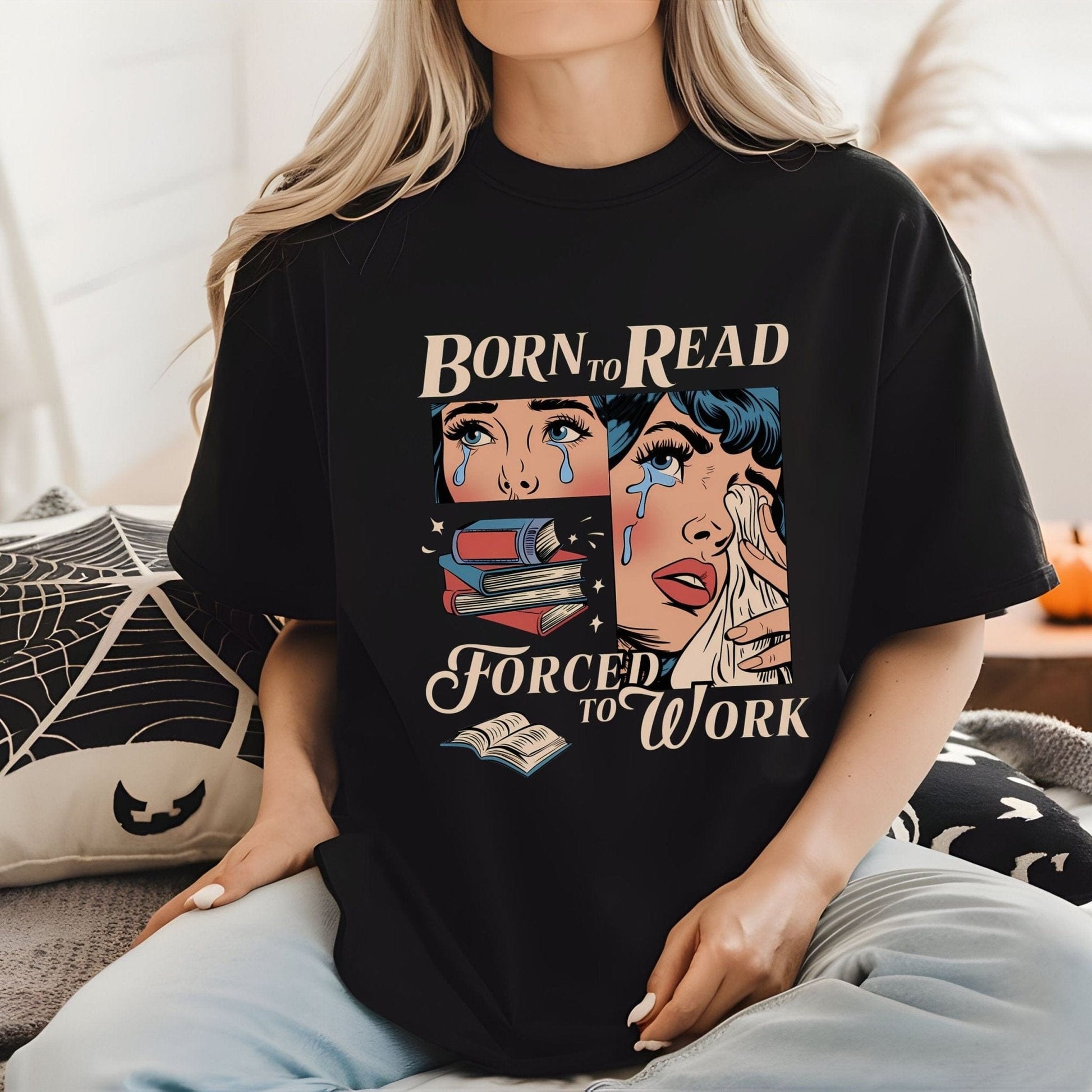 Comic-style “Born to Read, Forced to Work” t-shirt with crying girl, stacked books, and vintage pop-art design.