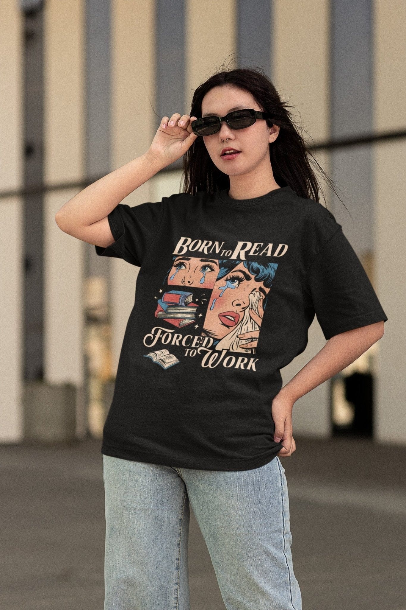 Comic-style “Born to Read, Forced to Work” t-shirt with crying girl, stacked books, and vintage pop-art design.