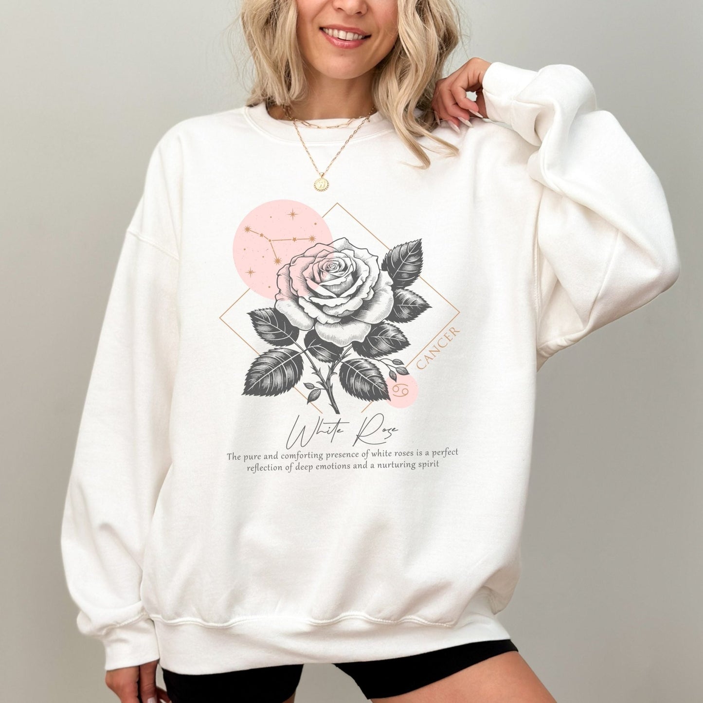 Cancer zodiac sweatshirt with white rose design.