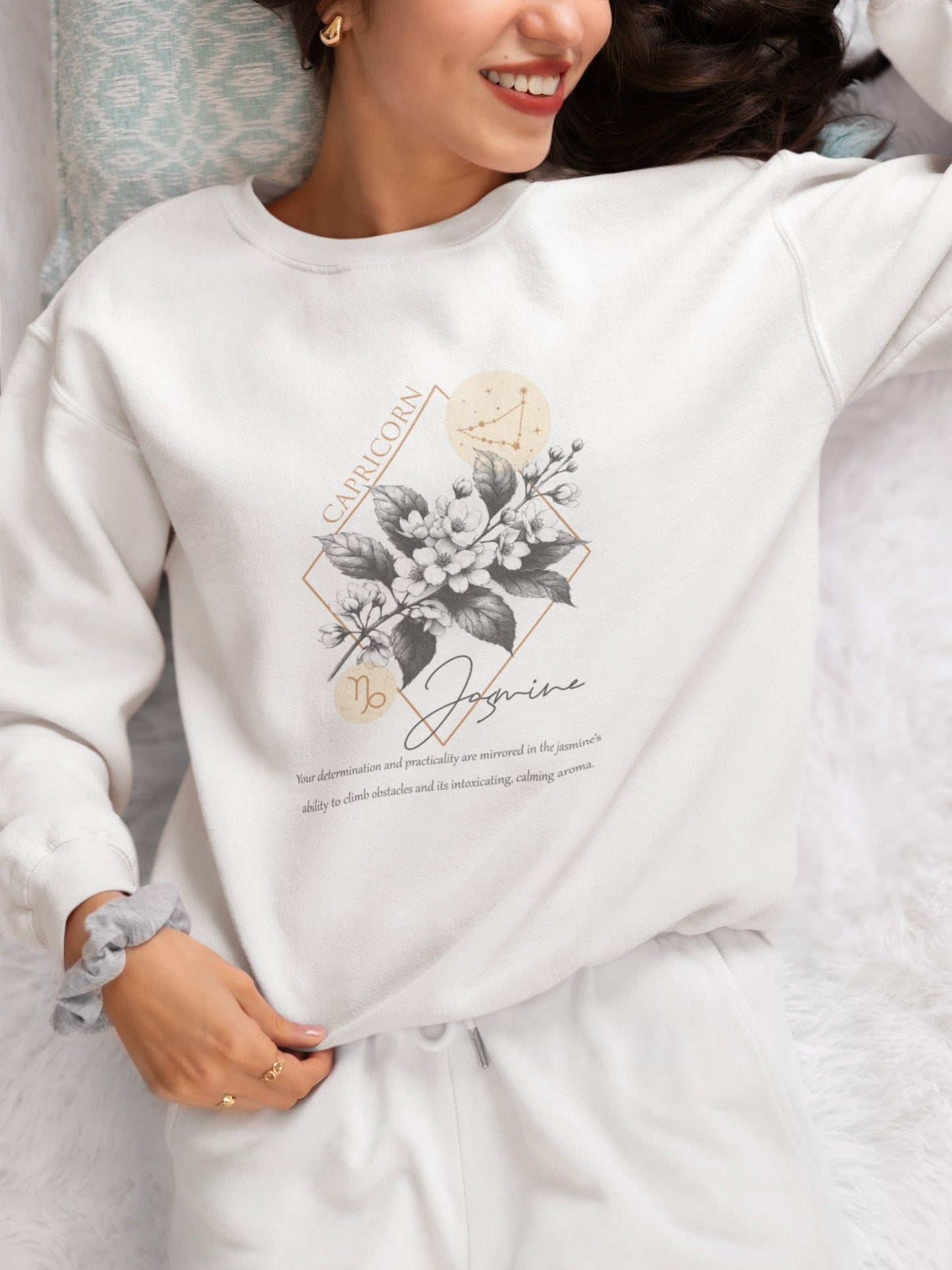 Capricorn sweatshirt with jasmine design.