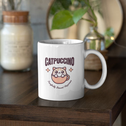 Cute cat coffee mug with "Catpuccino" design, perfect for cat and coffee lovers.