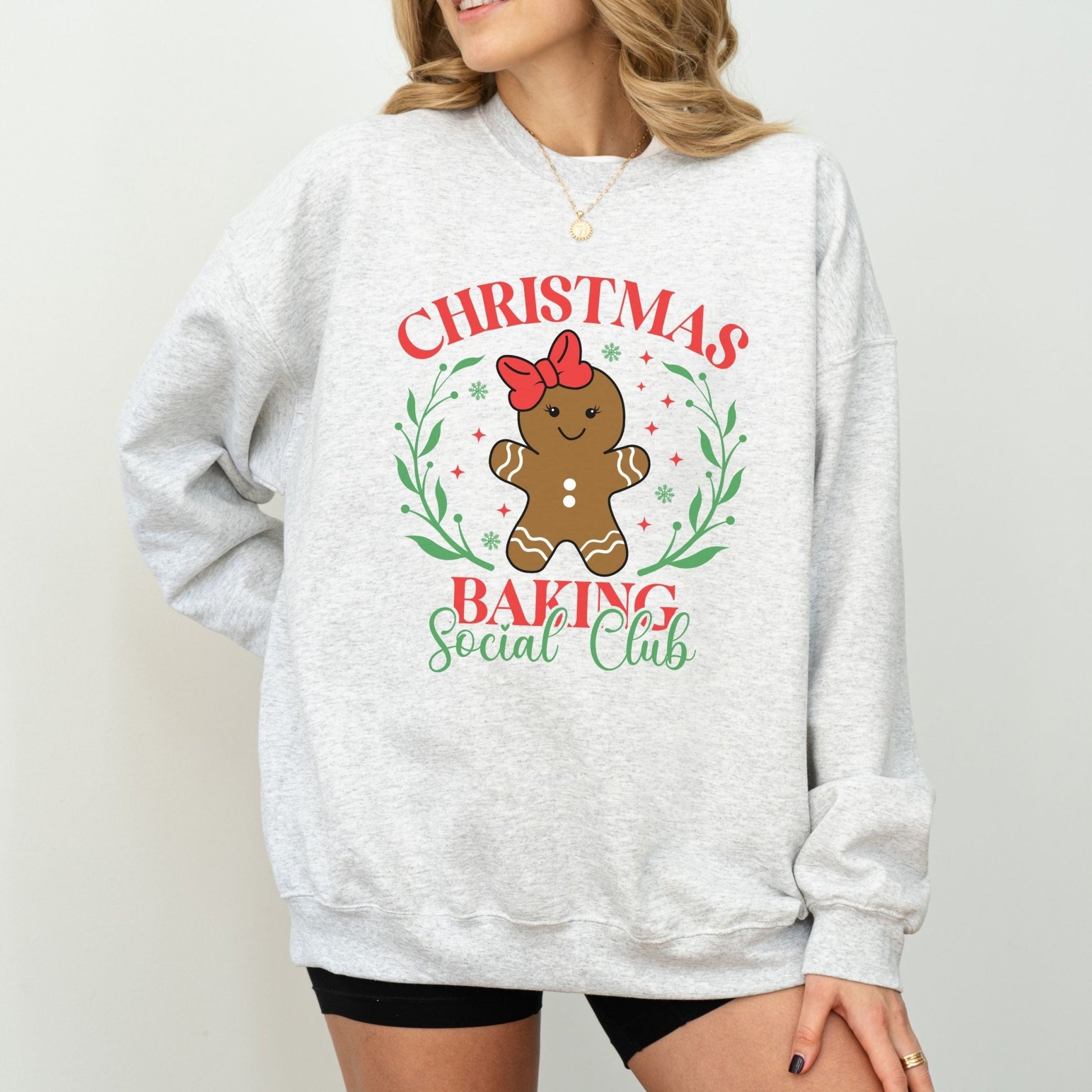 Christmas baking sweatshirt with gingerbread graphic and festive holiday design.