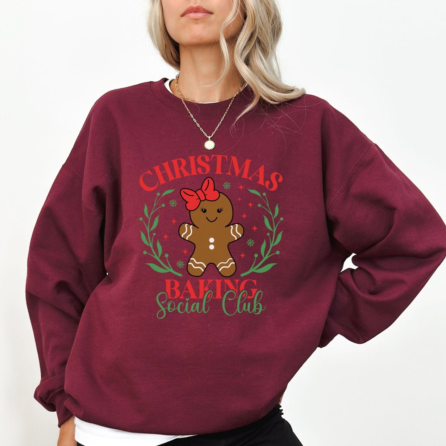 Christmas baking sweatshirt with gingerbread graphic and festive holiday design.