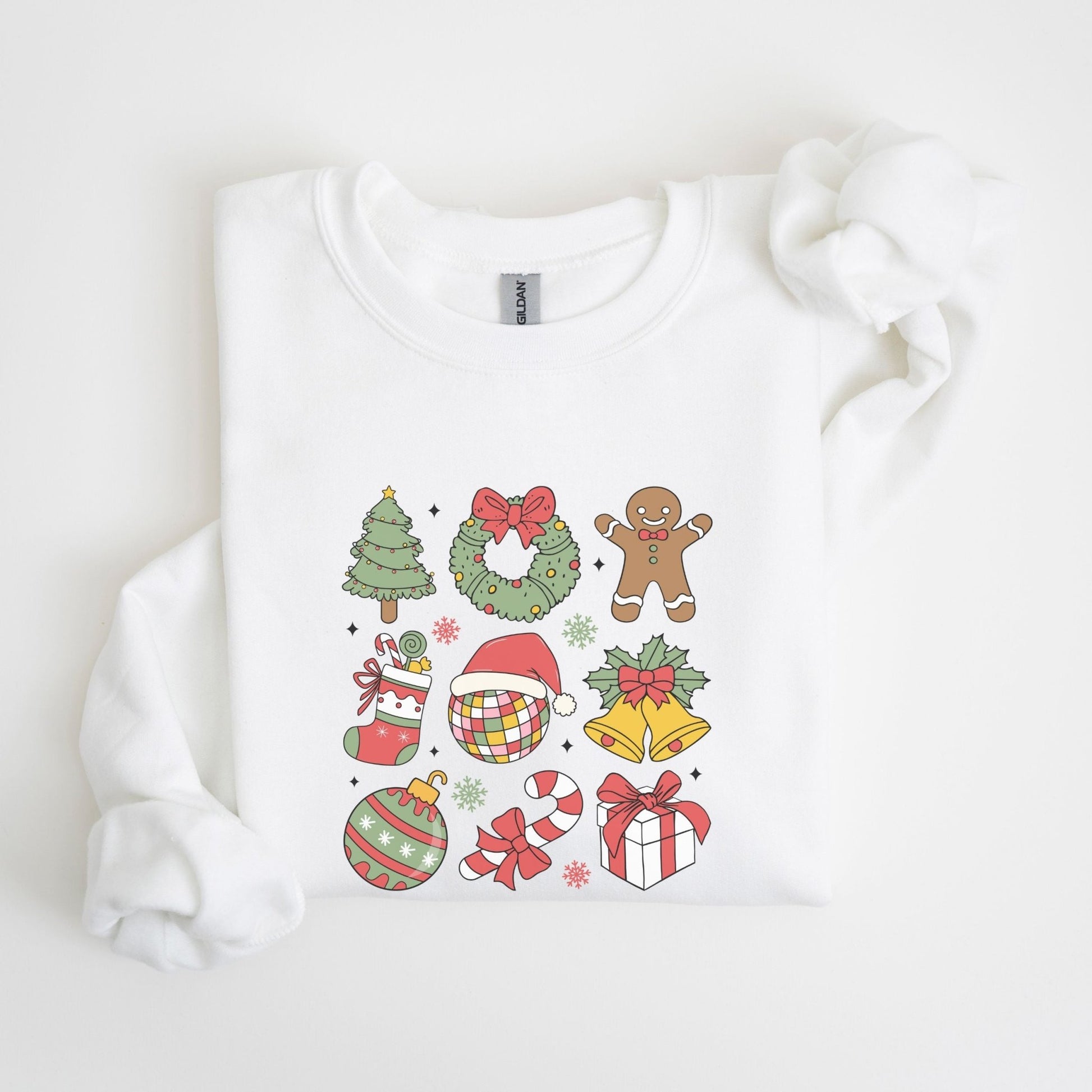 Christmas sweatshirt with festive holiday icons like trees, wreaths, and gingerbread men. Comes in 6 colors, perfect for cozy winter wear.