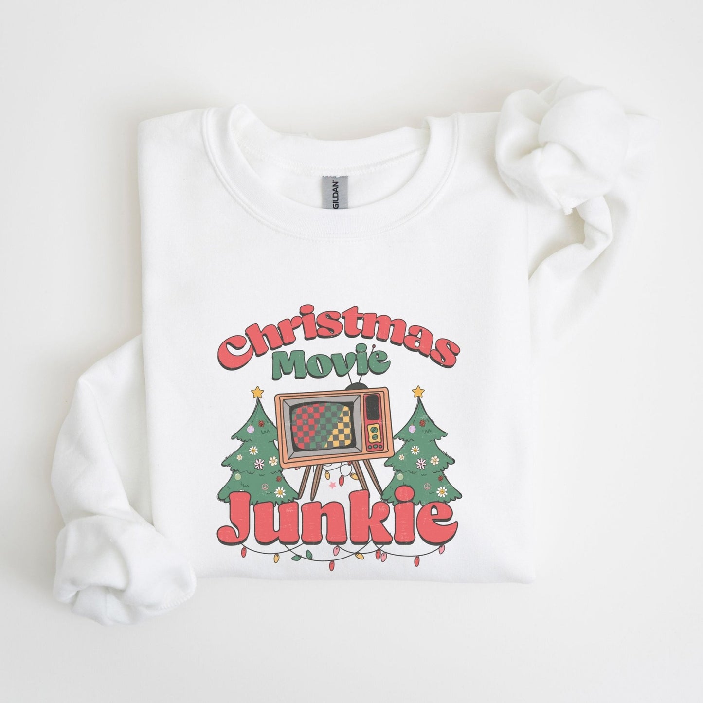 Retro Christmas movie sweatshirt with TV and holiday tree design, ideal for Christmas movie fans and cozy holiday wear.