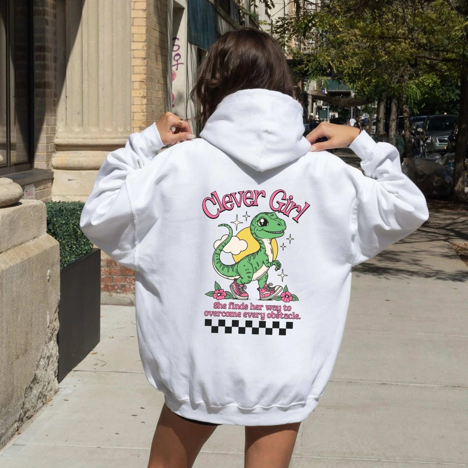 Clever Girl Dino hoodie with cute dinosaur design, perfect for playful fashion and girl power.