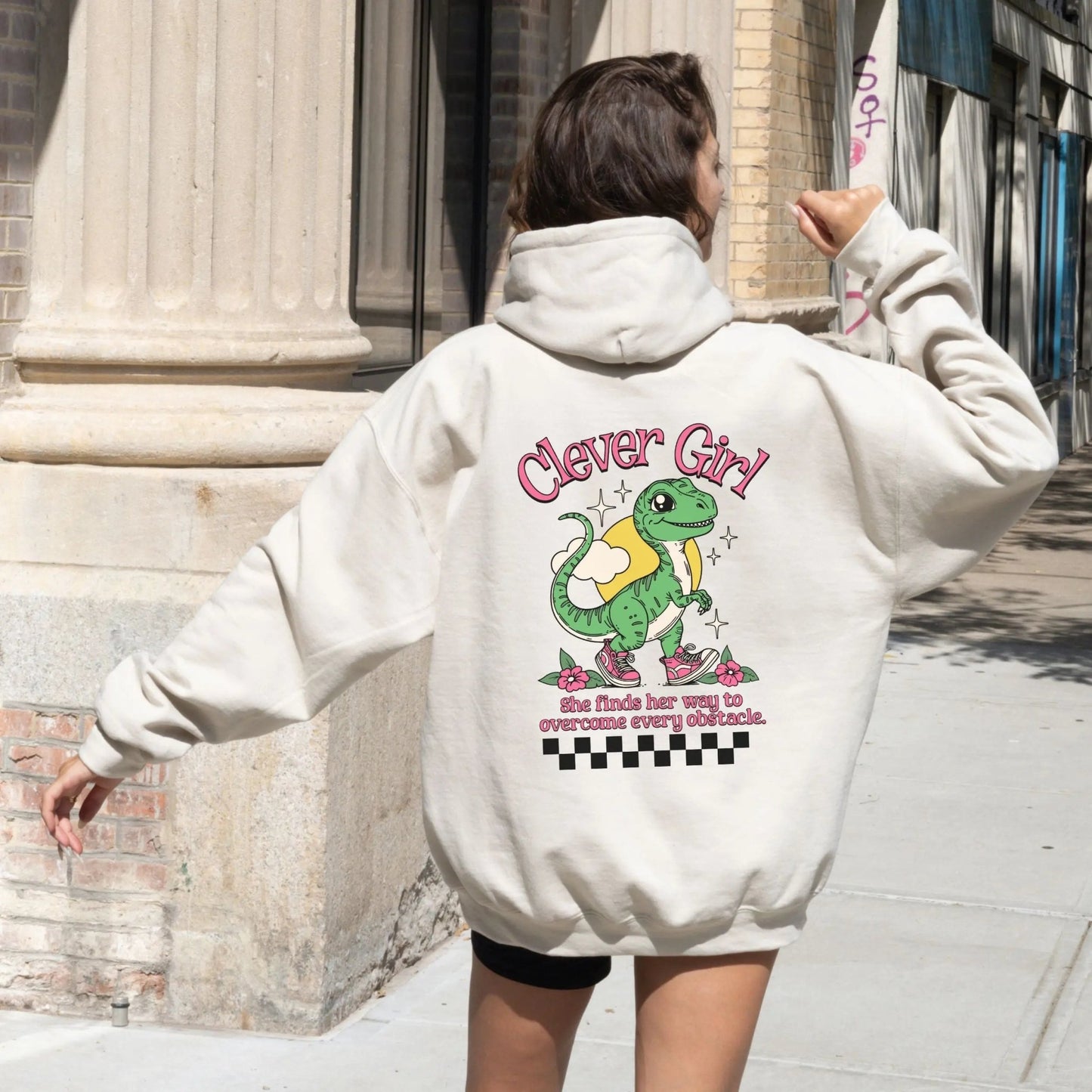 Clever Girl Dino hoodie with cute dinosaur design, perfect for playful fashion and girl power.